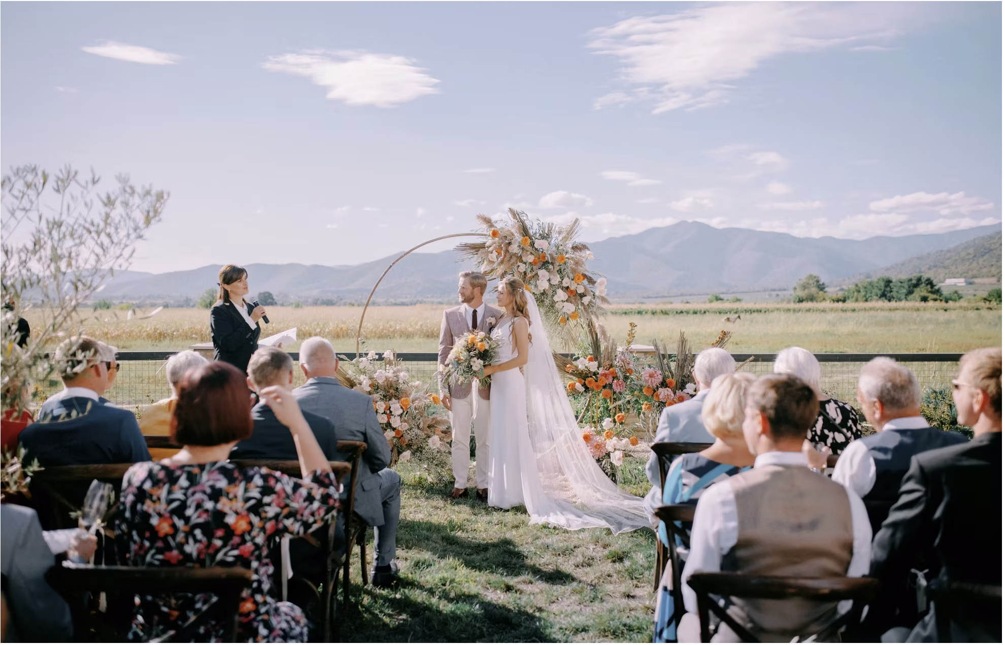 The grassy outdoor space where the ceremony will be held